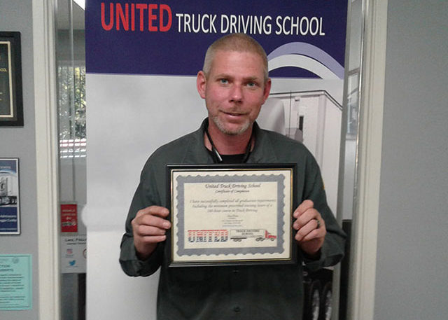 Image of Derek Fox with CDL certificate