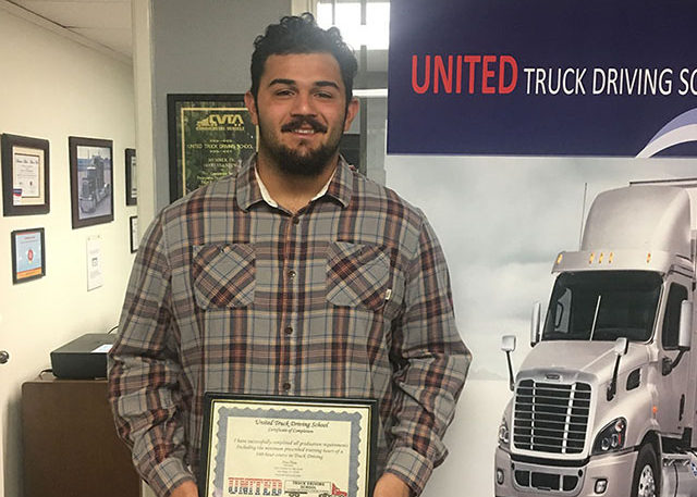 Image of Aaron Boecker with CDL certificate