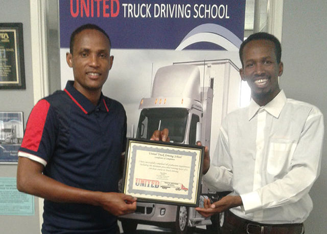 Image of Hussein F and Admed M with CDL certificate