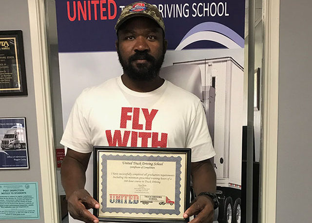 Image of Timothy R with CDL certificate