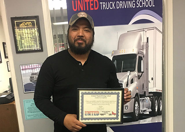 Image of Jason Reyes with CDL certificate