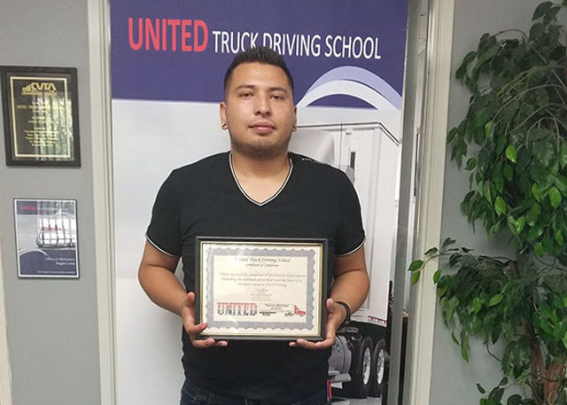 Image of Aldo G with CDL certificate