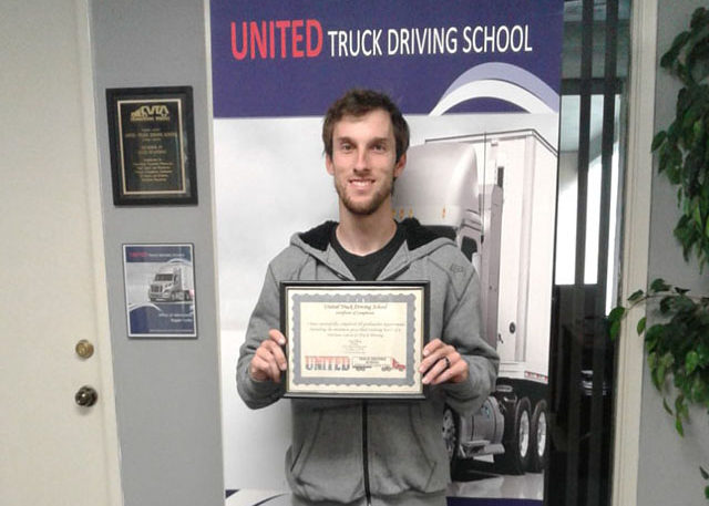 Image of Christopher with CDL certificate