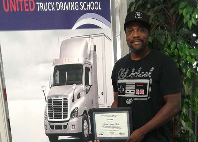Image of Jeremy Fairman with CDL certificate