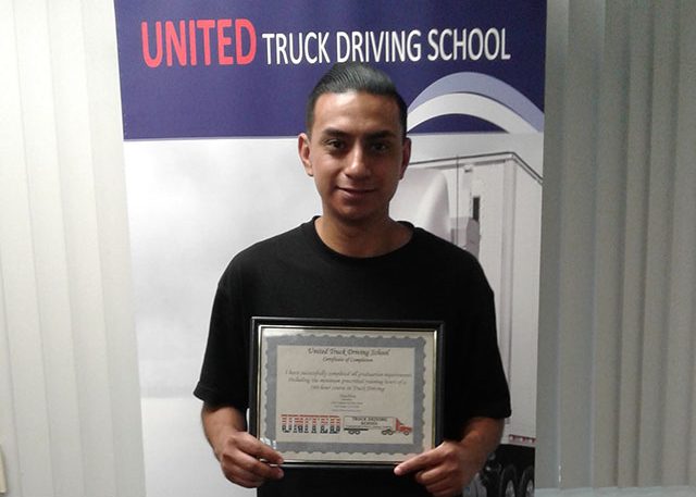 Image of Luis with CDL certificate