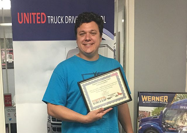 Image of Nick with certificate