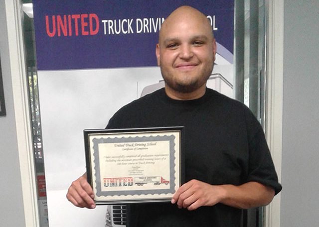 Image of Eli Leon with certificate