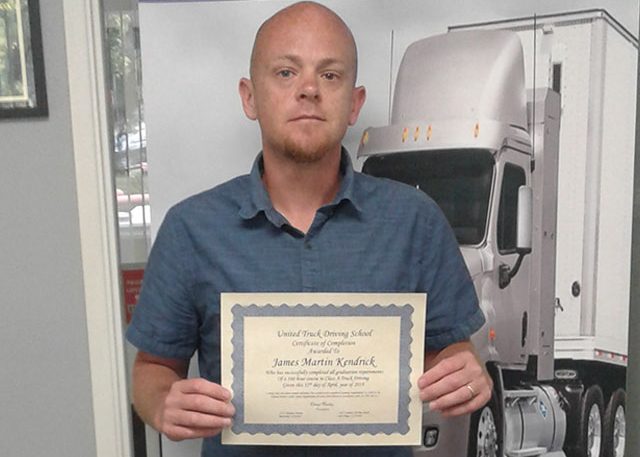 image of James Kendrick with certificate