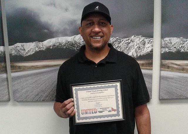 Image of LaVar McCoy with certificate