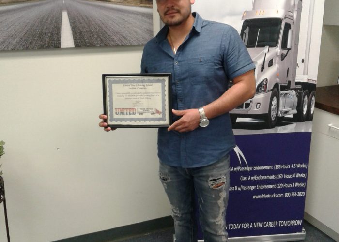 Image of Daniel Acev with certificate