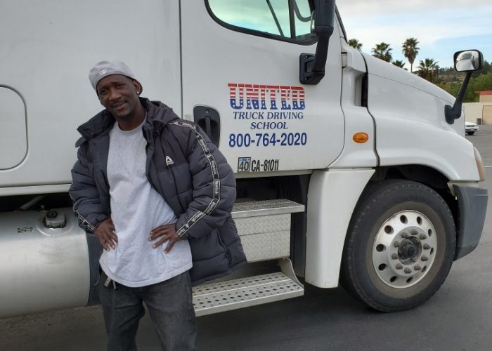 Image of Elton Wilson in front of United truck